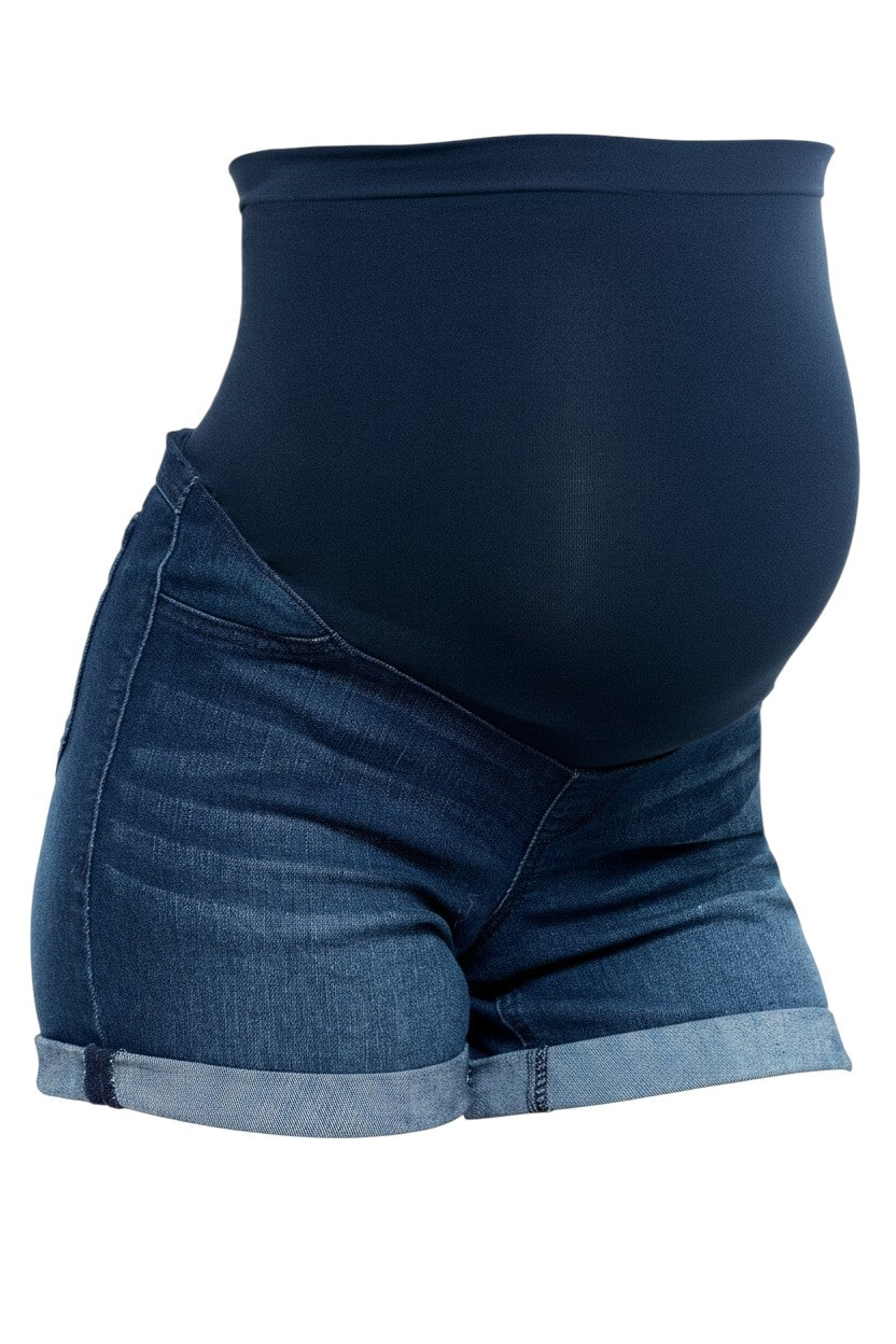Mom & Me Boutique medium wash maternity denim shorts with a navy over-the-belly waistband and roll cuff detail.
