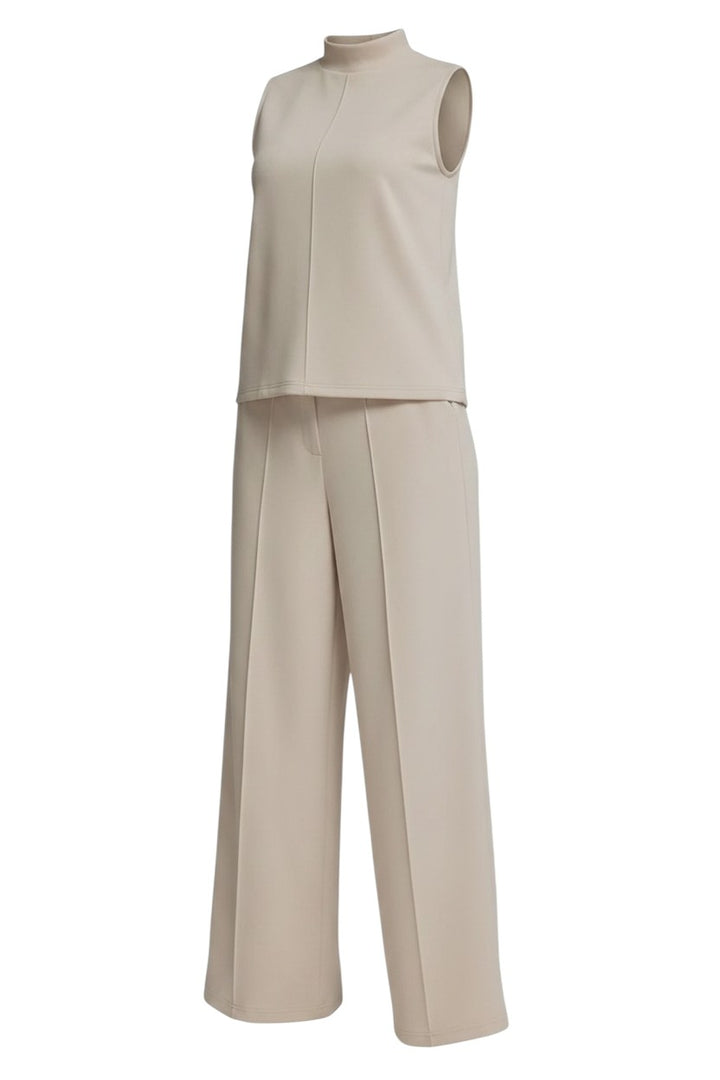 Mom & Me Boutique almond knit set featuring a sleeveless mock neck top and wide leg pants with a center seam.