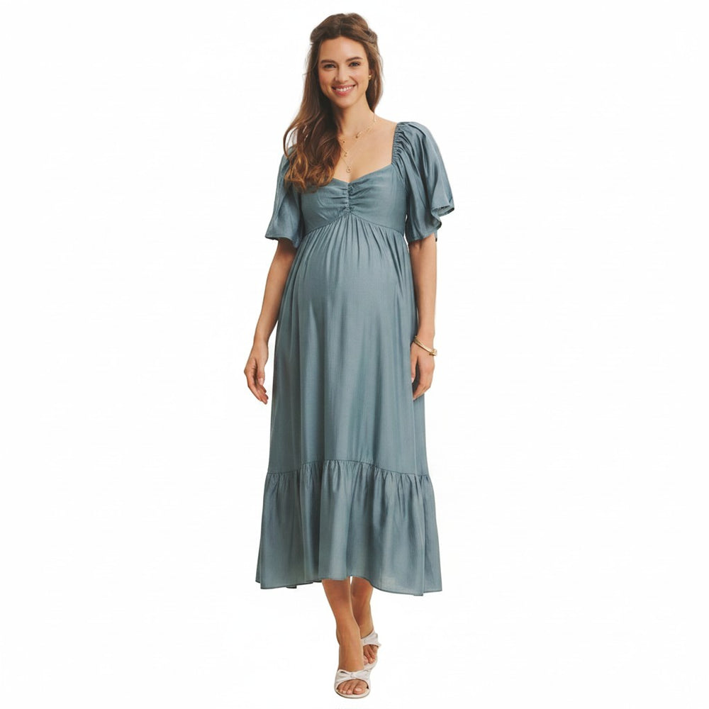Mom & Me Boutique Avery midi dress in dusk blue featuring a sweetheart neckline, flutter sleeves, and side pockets.