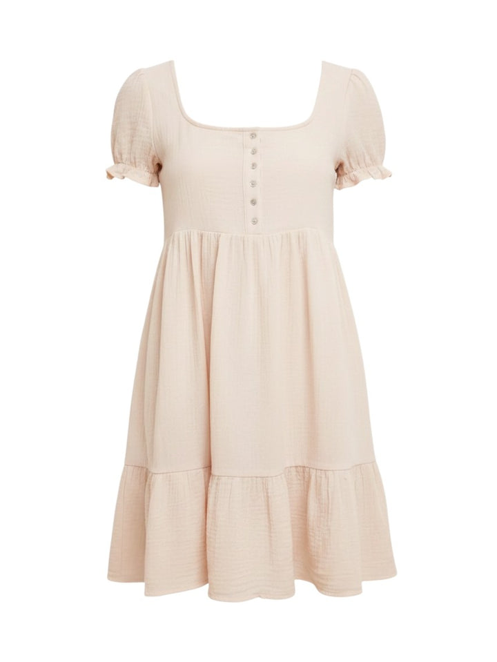 Mom & Me Boutique Bexley mini dress in light beige cotton with puff sleeves, button front, and flounce hem.