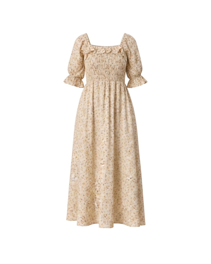 Mom & Me Boutique Birdie Dress in lemon meadow print with puff sleeves, smocked bodice, and ruffle details.