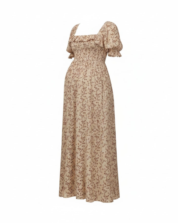 Mom & Me Boutique Birdie floral toile maxi dress in natural yellow with puff sleeves, smocking, and ruffle detail.