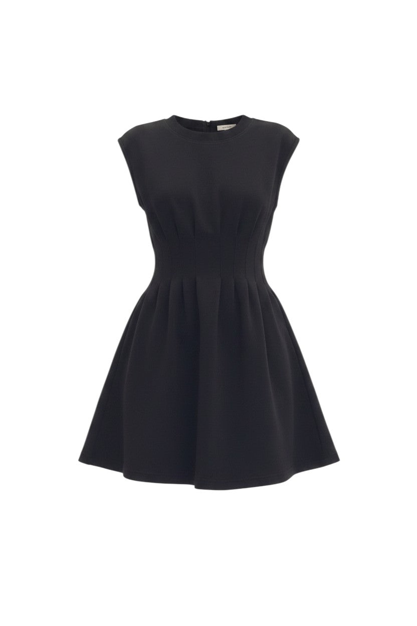 Mom & Me Boutique black cap sleeve mini dress with vertical pintuck bodice detail and side pockets in knit fabric.