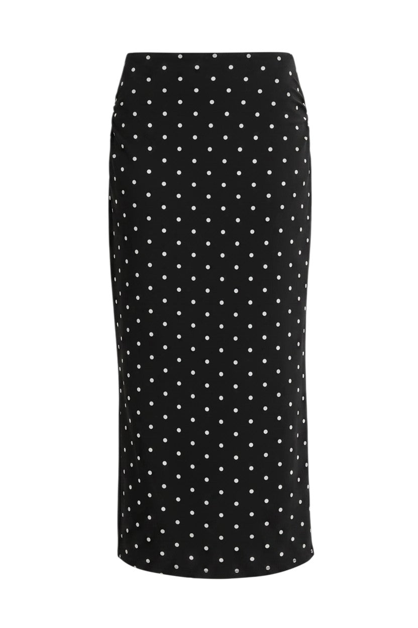 Mom & Me Boutique Dotti midi skirt in black with white polka dots, featuring ruched sides and a stretchy fabric.