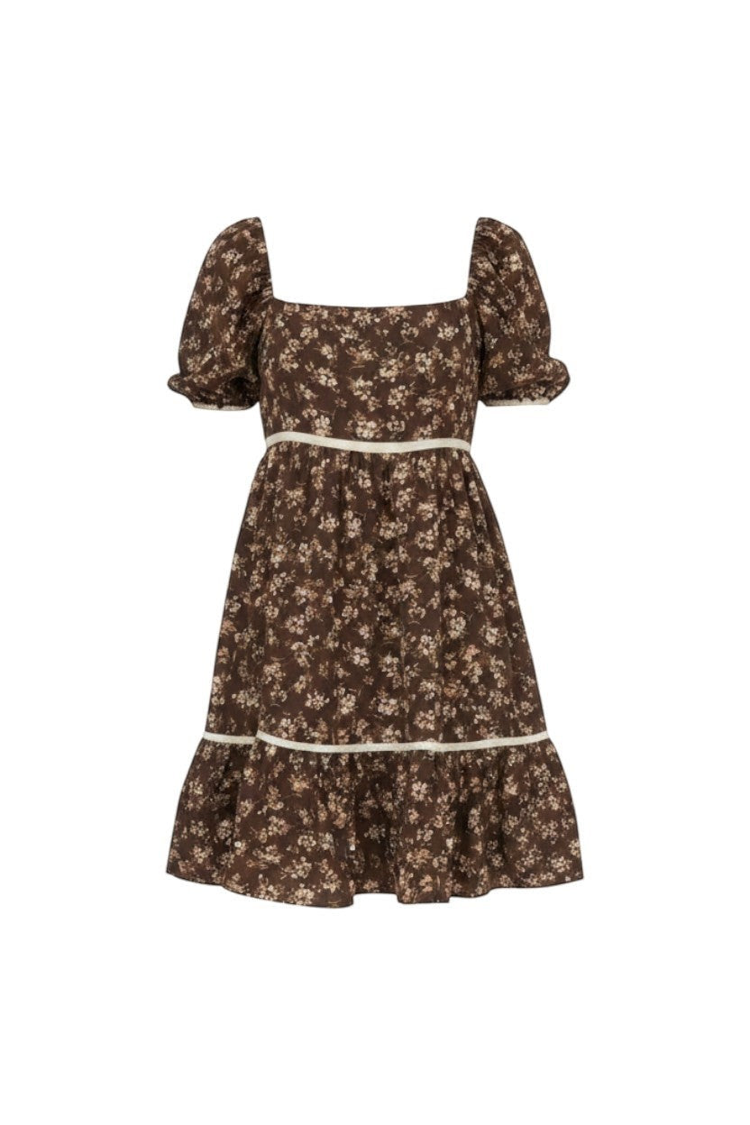 Mom & Me Boutique Shea brown floral mini dress with square neckline, puff sleeves, and white contrast trim detail.