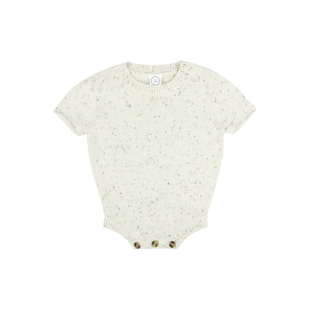 Mom & Me Boutique cream speckle knit cotton onesie with short sleeves and bottom button closure for easy changes.