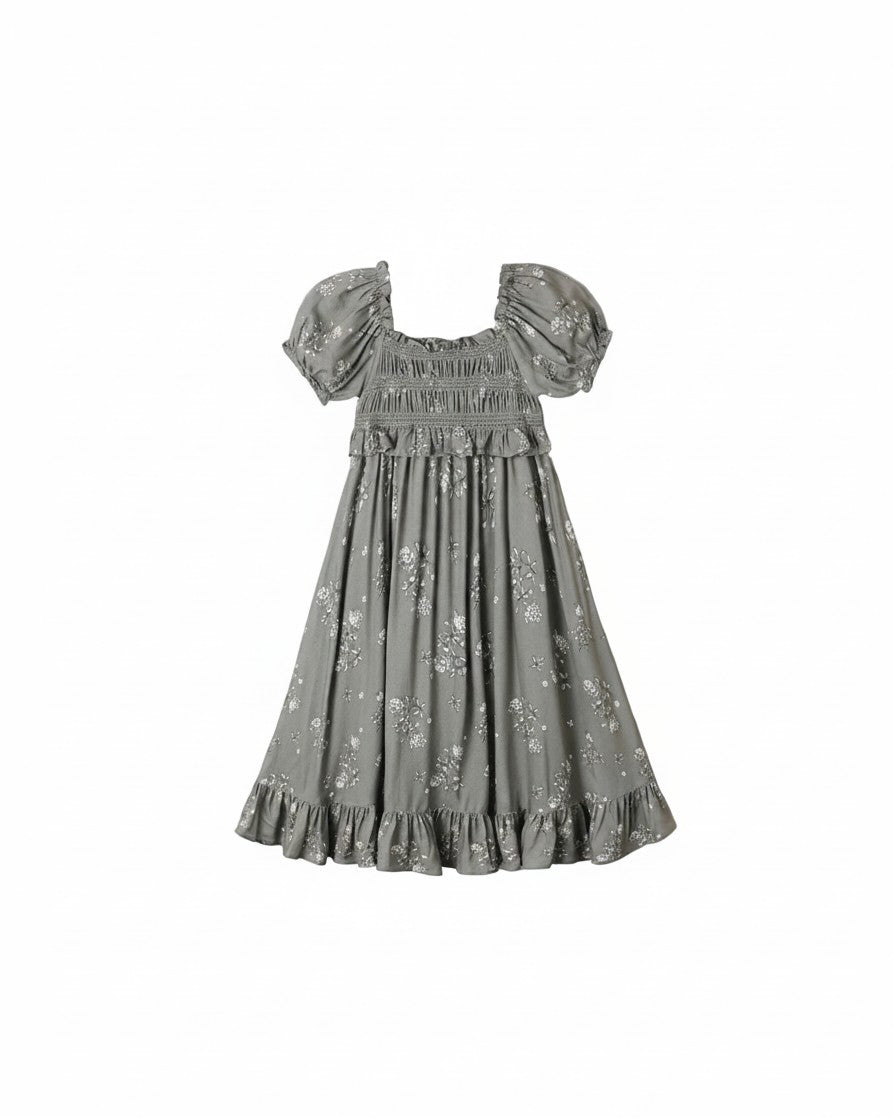 Mom & Me Boutique Maggie dress in eucalyptus green with a white French floral print, puff sleeves, and ruffled hem.