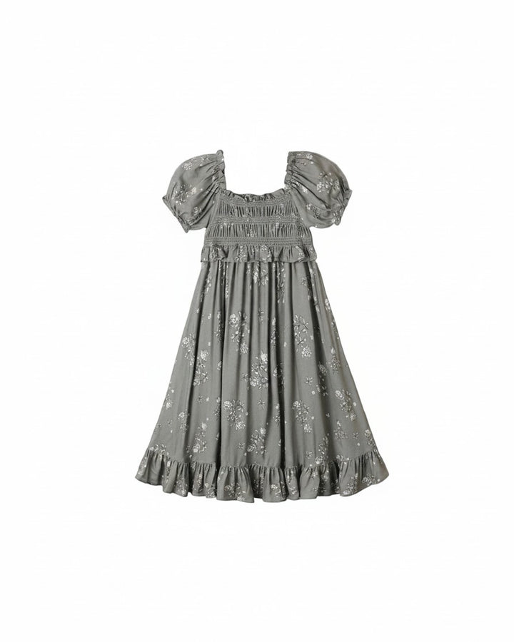 Mom & Me Boutique Maggie dress in eucalyptus green with a white French floral print, puff sleeves, and ruffled hem.