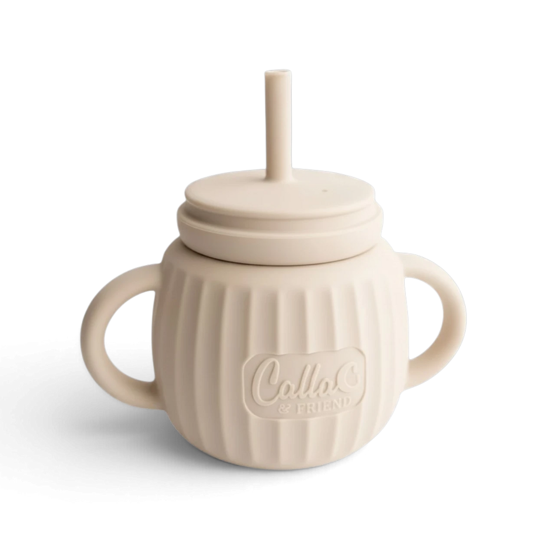 Mom & Me Boutique fawn silicone Brody Cup with two handles, straw lid, and ribbed texture for toddlers.