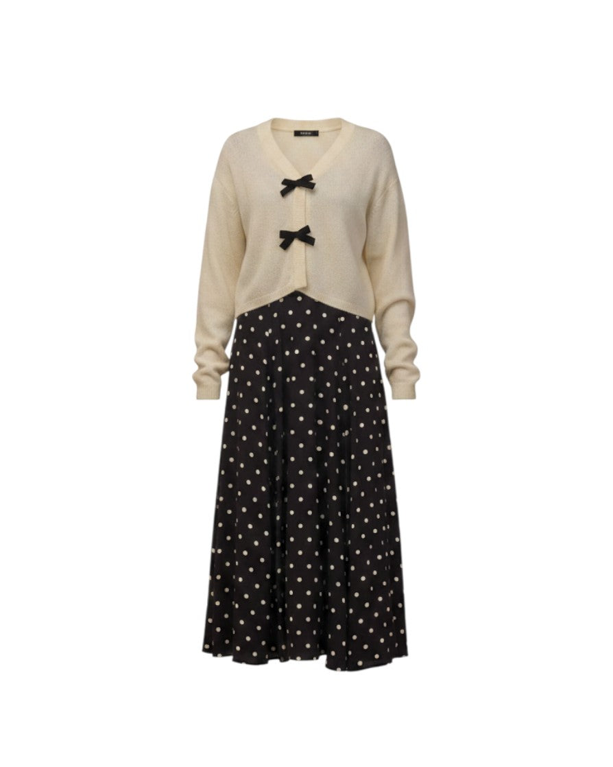 Mom & Me Boutique ivory knit cardigan with black bow details paired with a black polka dot midi skirt