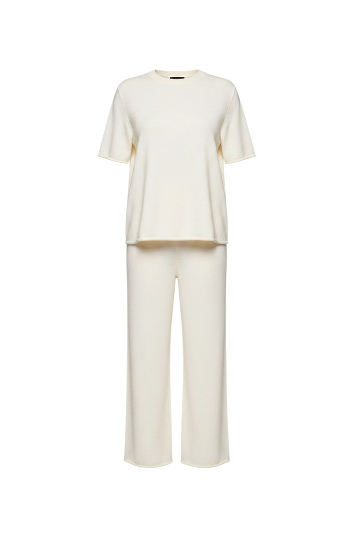 Mom & Me Boutique ivory knit women's set featuring a short-sleeve top and wide-leg pants with rolled-edge details.