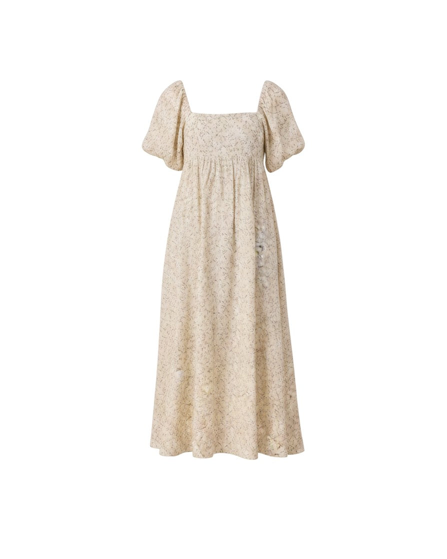Mom & Me Boutique ivory cotton maxi dress with a green vine print, empire waist, and puffed sleeves.