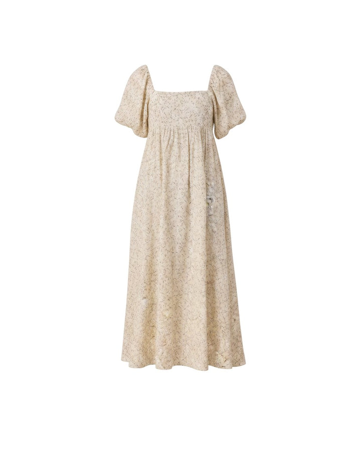 Mom & Me Boutique ivory cotton maxi dress with a green vine print, empire waist, and puffed sleeves.