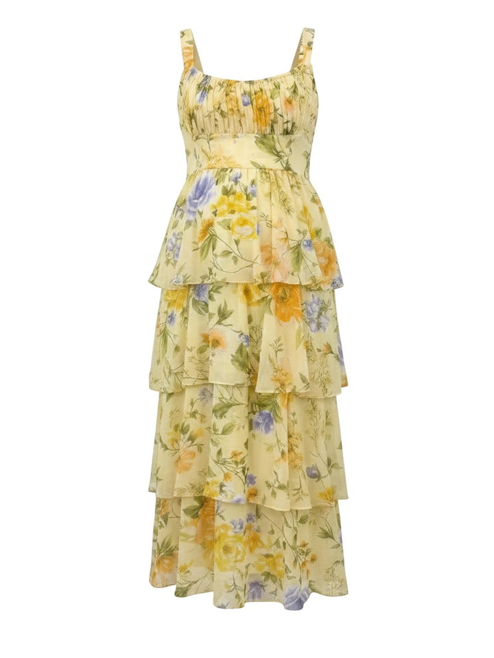 Mom & Me Boutique Lorelei floral sleeveless tiered midi dress in yellow with a smocked bodice and rayon blend fabric.