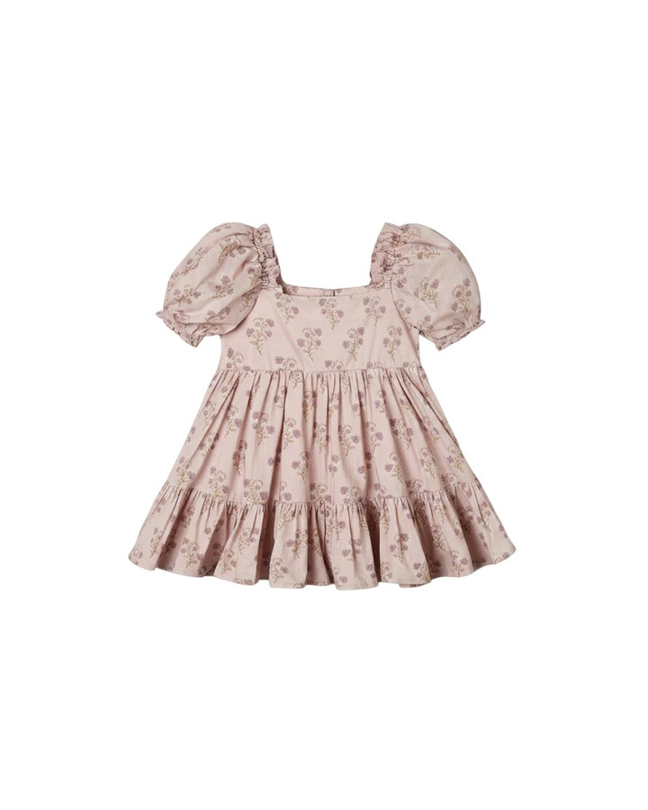 Mom & Me Boutique Louella dress in ivory with a rose meadow floral print, puff sleeves, and a tiered skirt.