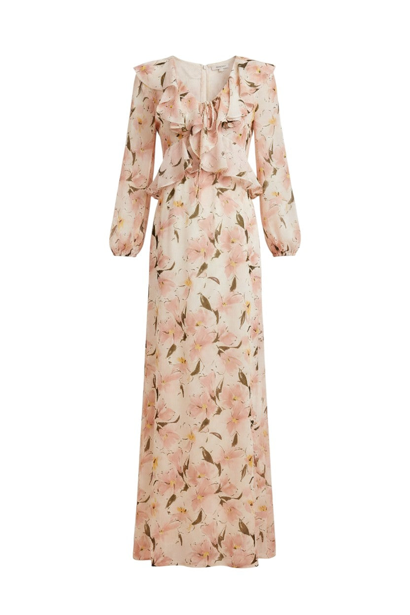 Mom & Me Boutique Mavis floral chiffon maxi dress with ruffled neckline, voluminous sleeves, and elastic waist.