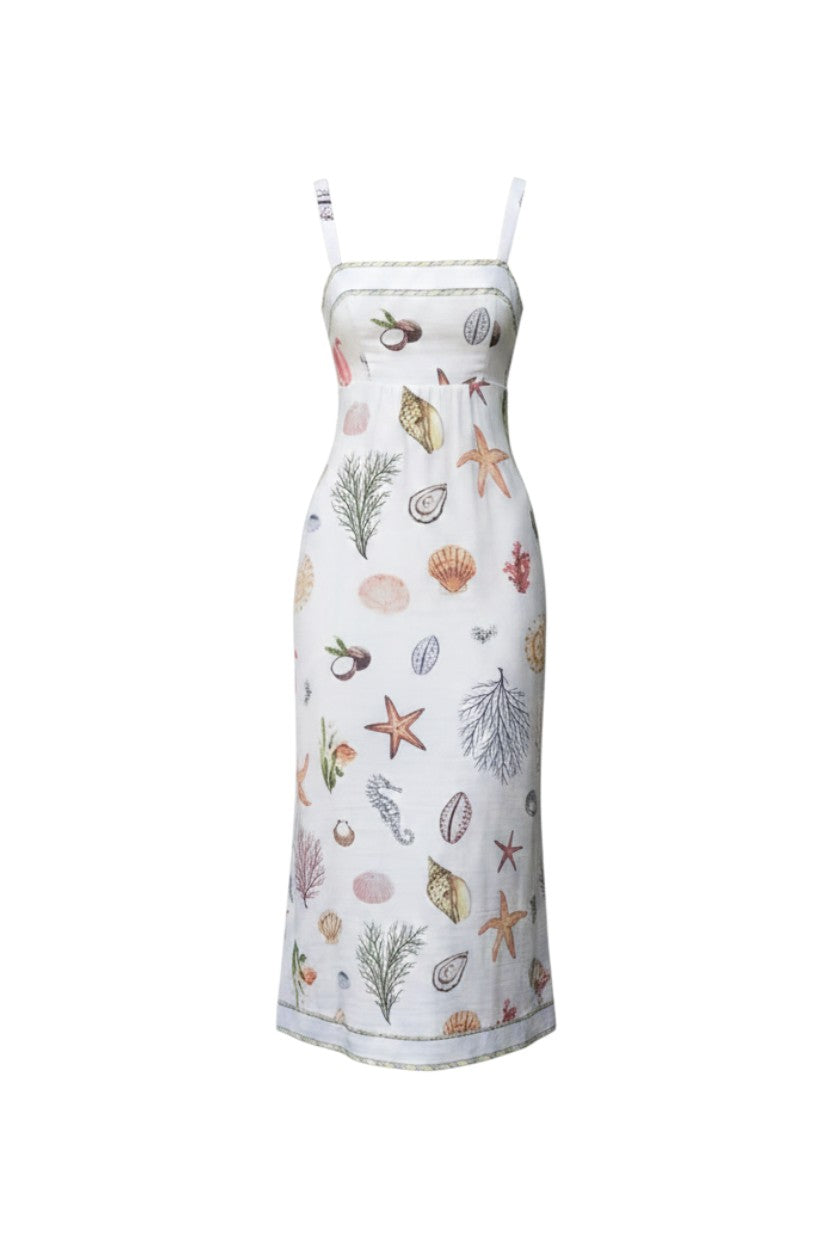 Mom & Me Boutique Nattie midi dress in white with a multicolor nautical seashell print, square neckline, and straps.