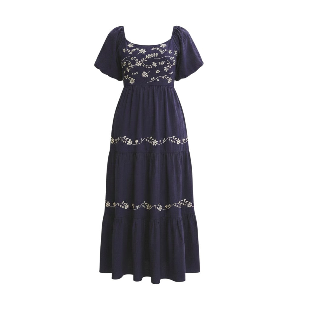 Mom & Me Boutique midnight navy cotton maxi dress with puff sleeves, floral embroidery, and tiered ruffles.