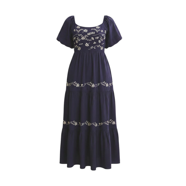 Mom & Me Boutique midnight navy cotton maxi dress with puff sleeves, floral embroidery, and tiered ruffles.