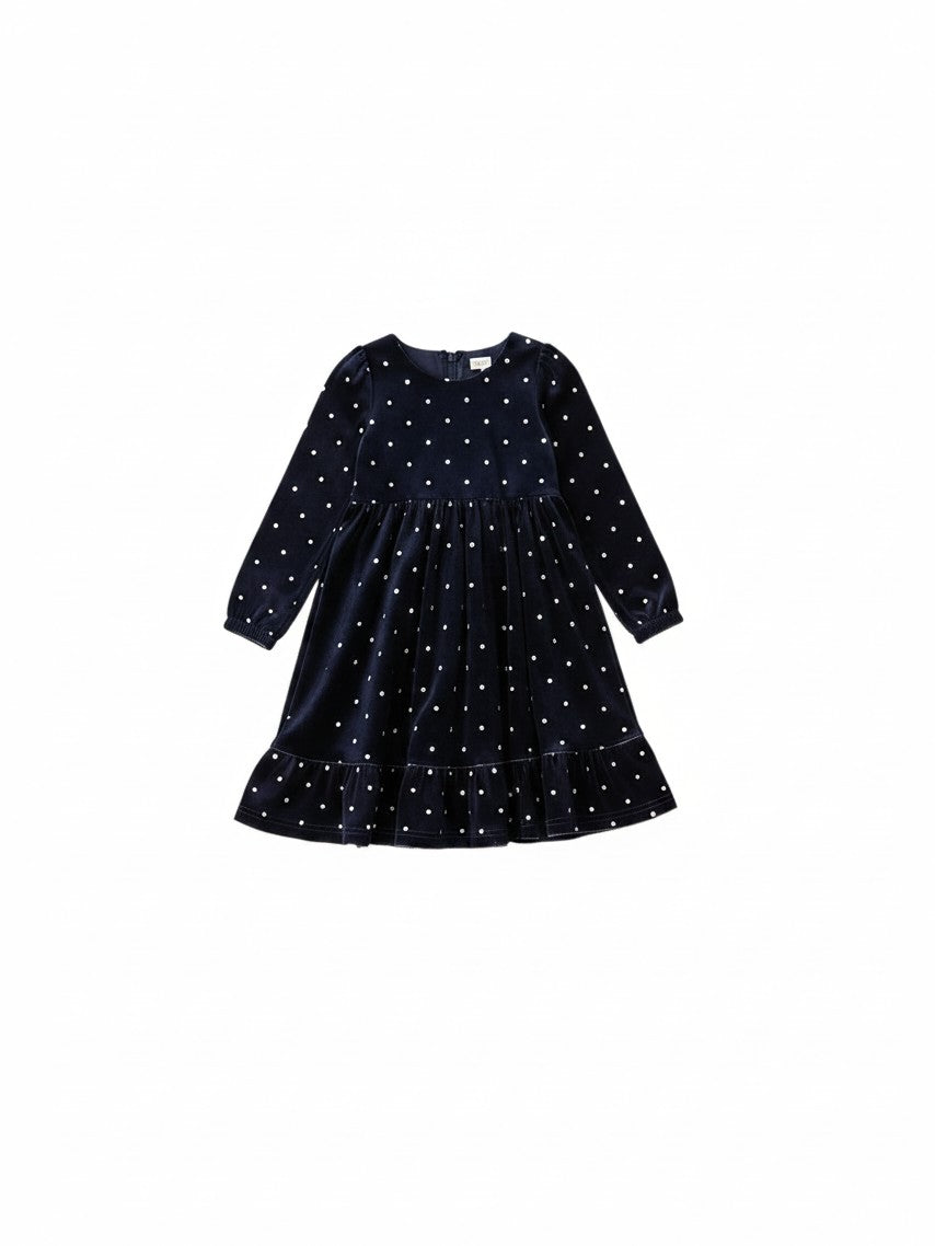 Mom & Me Boutique navy blue velvet Dottie dress with white polka dots, long sleeves, and a ruffled hem.