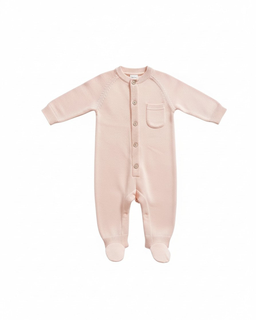 Mom & Me Boutique pale pink organic cotton knit baby jumpsuit with front buttons and a small chest pocket