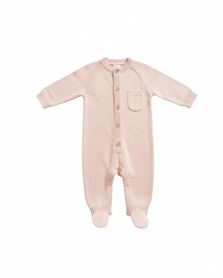 Mom & Me Boutique pale pink organic cotton knit baby jumpsuit with front buttons and a small chest pocket