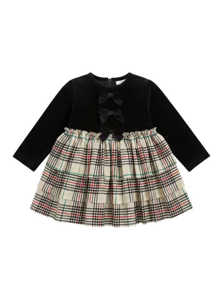 Mom & Me Boutique baby girls plaid skirted romper with a black velour bodice and tiered tulle skirt with bow accents.