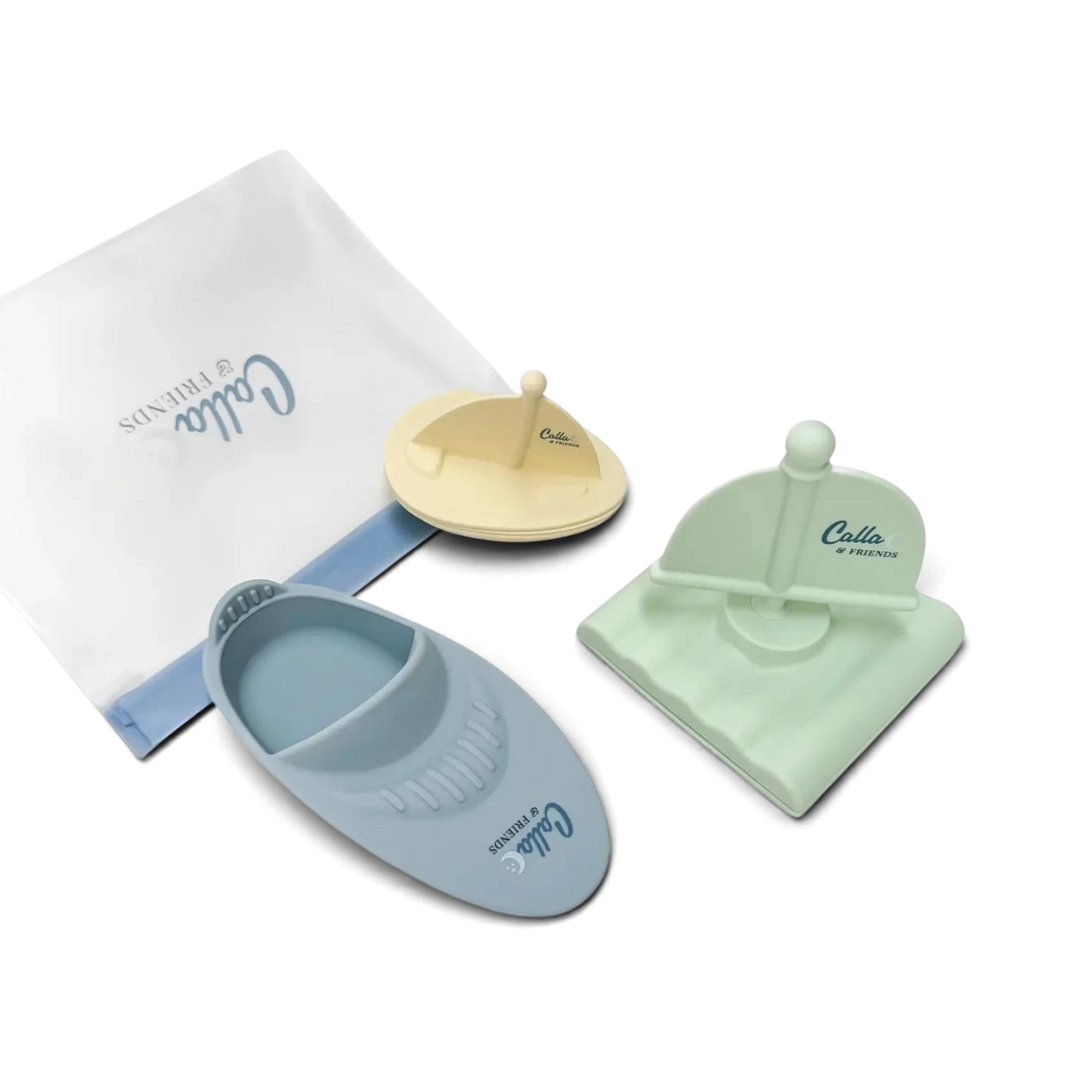 Mom & Me Boutique silicone bath boat set in pastel blue, cream, and sage green with a storage bag for water play.