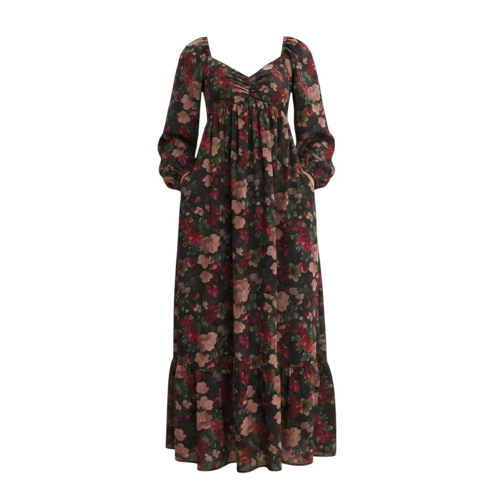 Mom & Me Boutique Sylvie maxi dress featuring a sweetheart neckline, long balloon sleeves, and a floral print.
