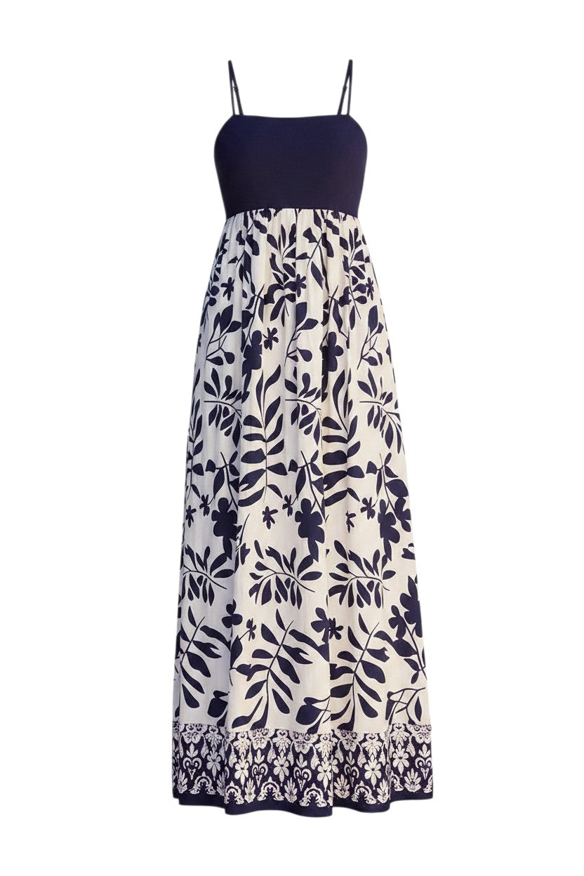 Mom & Me Boutique Thalia maxi dress featuring a navy bodice and cream skirt with a botanical leaf border print.