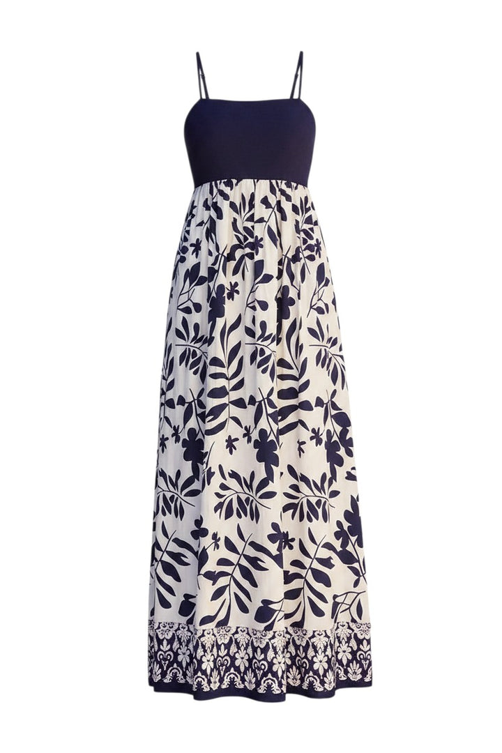 Mom & Me Boutique Thalia maxi dress featuring a navy bodice and cream skirt with a botanical leaf border print.